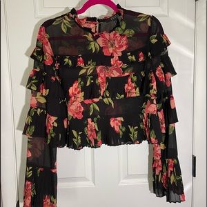 Sheer black and floral print top with pleated layers! Super cute! No filter